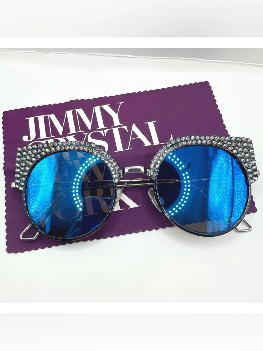 Jimmy Crystal New York Waikiki sunglasses feature a statement cat-eye silhouette